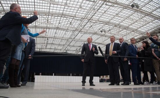 Russian President Vladimir Putin answers journalists' questions