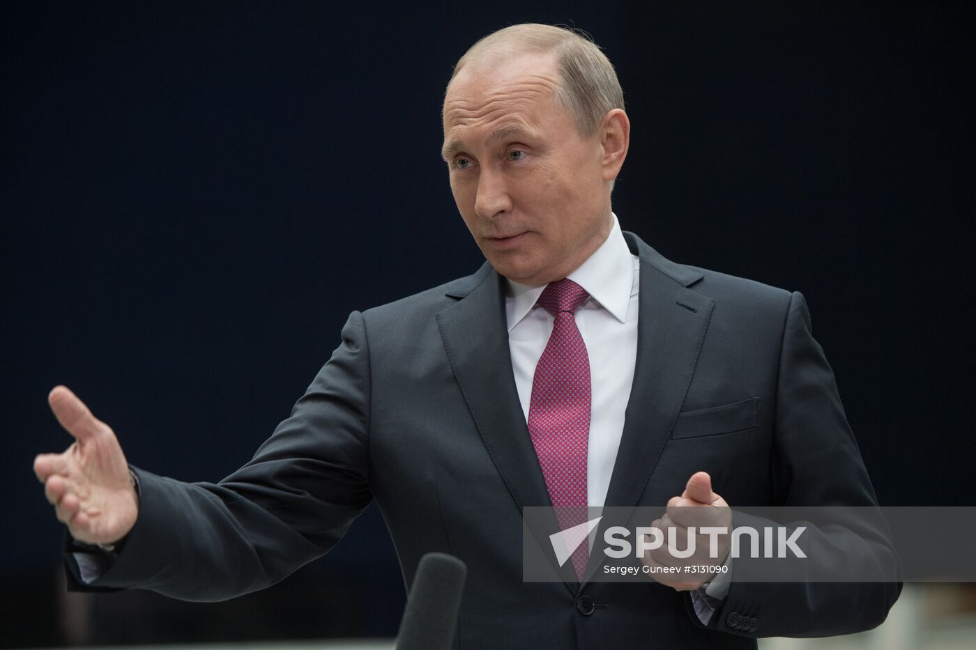 Russian President Vladimir Putin answers journalists' questions