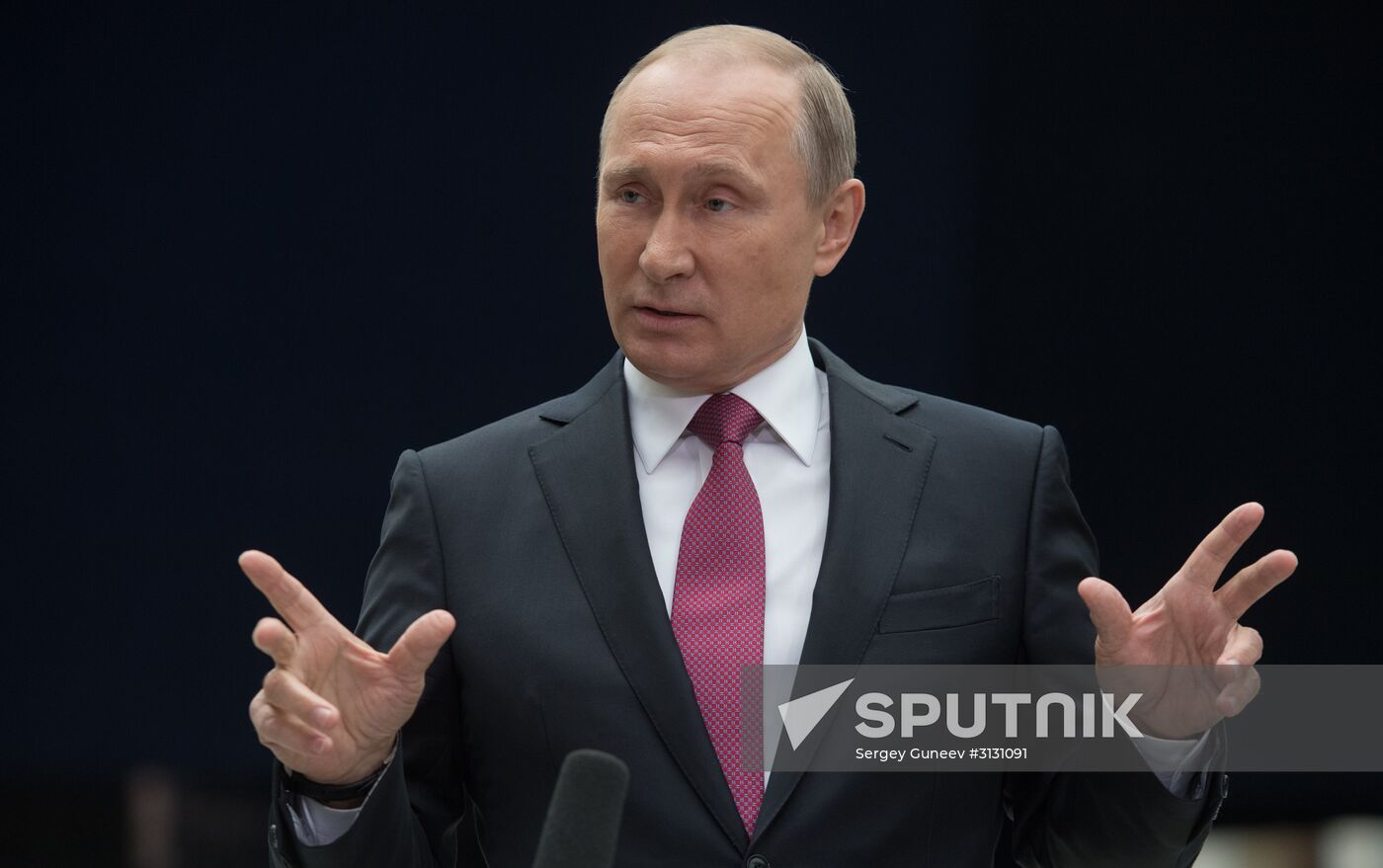 Russian President Vladimir Putin answers journalists' questions