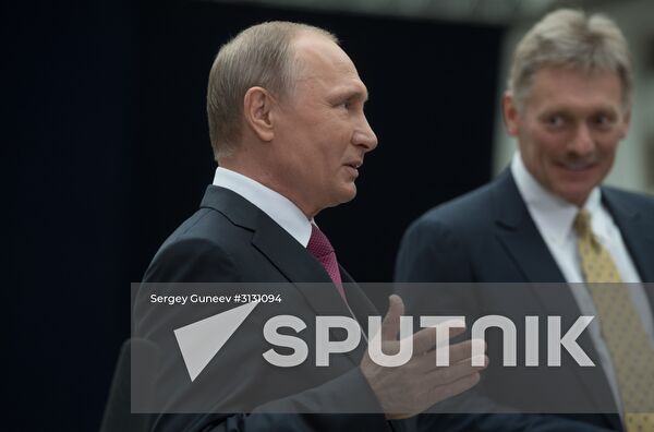 Russian President Vladimir Putin answers journalists' questions
