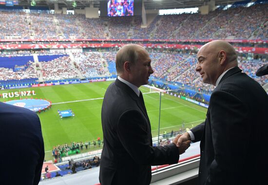 President Putin, Prime Minister Medvedev attend Confederations Cup opening match