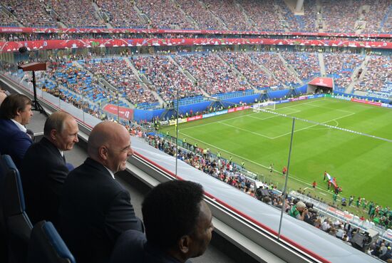 President Vladimir Putin and Prime Minister Dmitry Medvedev attend first match of 2017 Confederations Cup