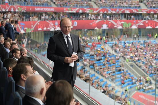 President Vladimir Putin and Prime Minister Dmitry Medvedev attend first match of 2017 Confederations Cup