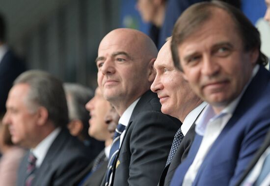 President Vladimir Putin and Prime Minister Dmitry Medvedev attend first match of 2017 Confederations Cup