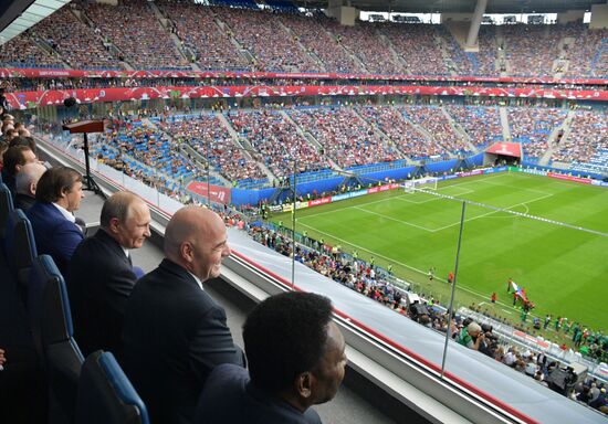 President Putin, Prime Minister Medvedev attend Confederations Cup opening match
