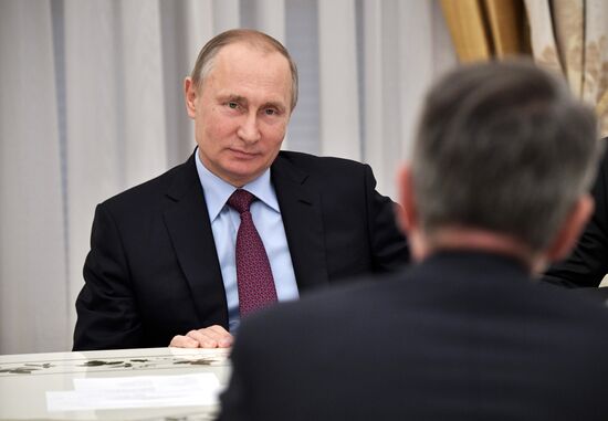 Russian President Vladimir Putin meets with Royal Dutch Shell CEO Ben van Beurden
