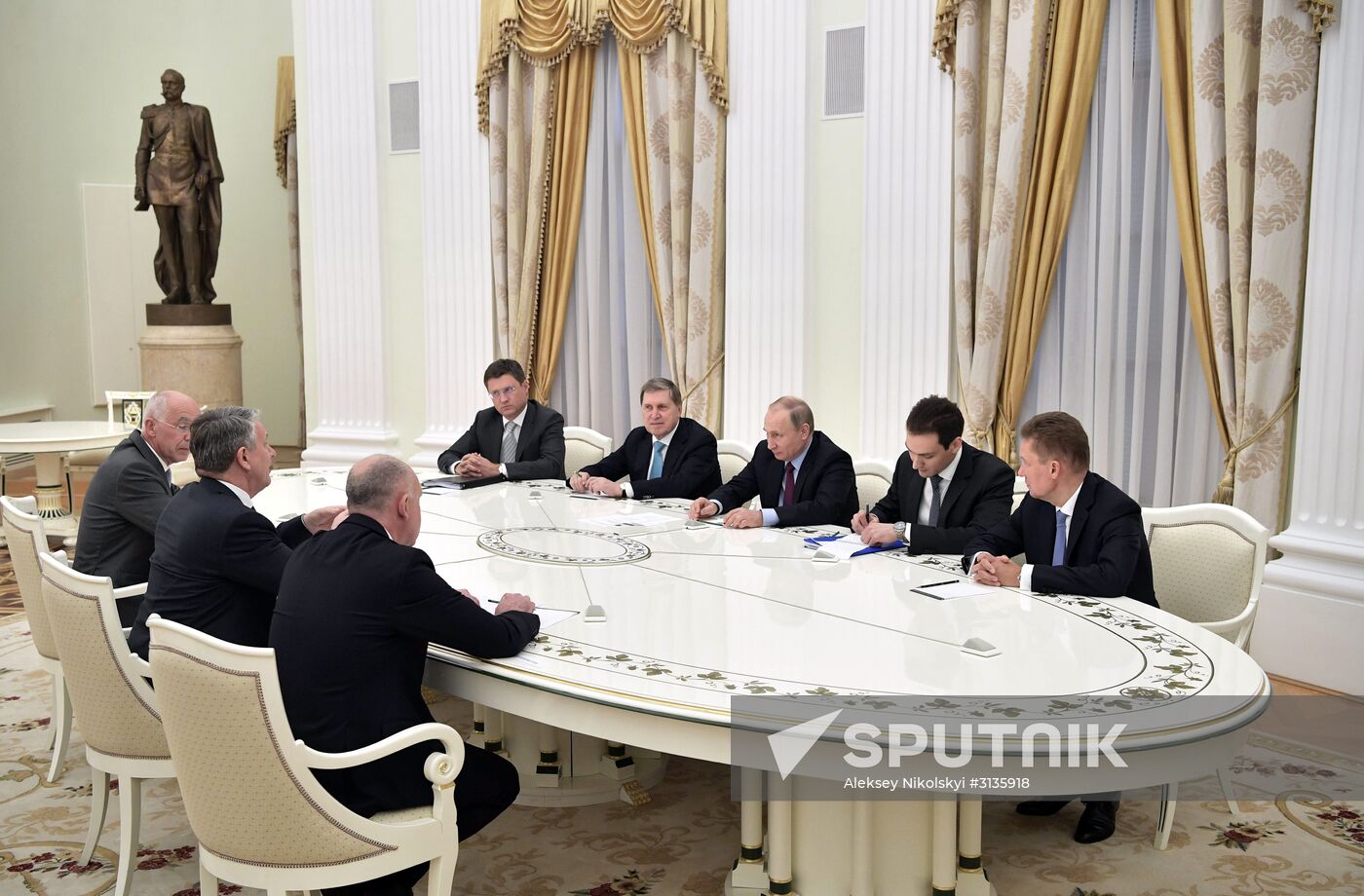 Russian President Vladimir Putin meets with Royal Dutch Shell CEO Ben van Beurden