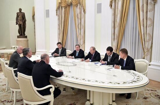 Russian President Vladimir Putin meets with Royal Dutch Shell CEO Ben van Beurden