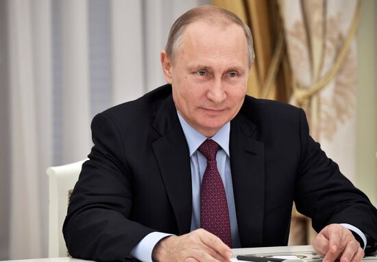 Russian President Vladimir Putin meets with Royal Dutch Shell CEO Ben van Beurden