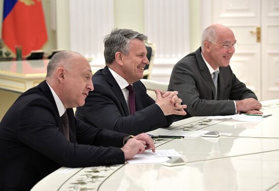 Russian President Vladimir Putin meets with Royal Dutch Shell CEO Ben van Beurden
