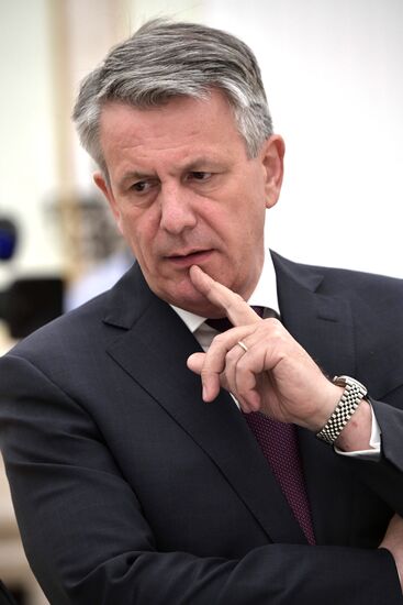 Russian President Vladimir Putin meets with Royal Dutch Shell CEO Ben van Beurden