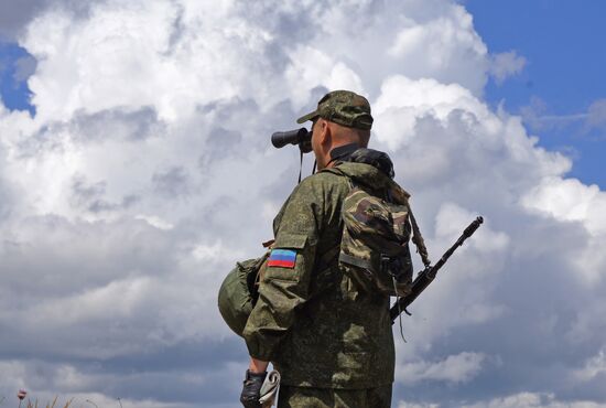 People's Militia of the Lugansk People's Republic soldier on position at the contact line in Donbas