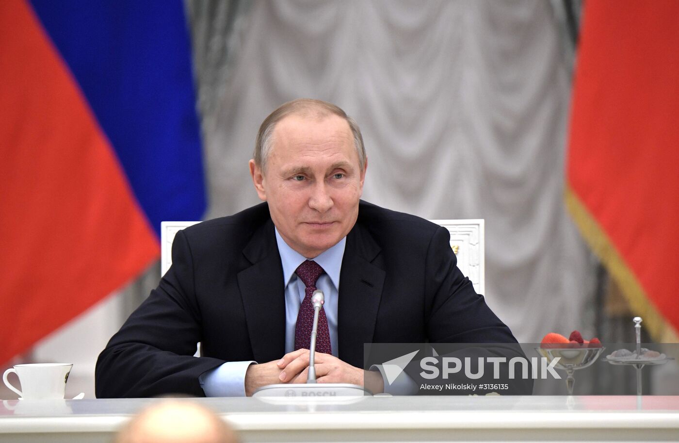 Russian President Vladimir Putin meets with graduating class teachers