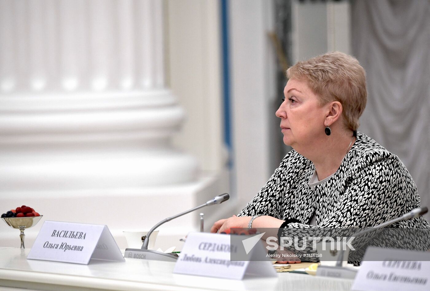 Russian President Vladimir Putin meets with graduating class teachers