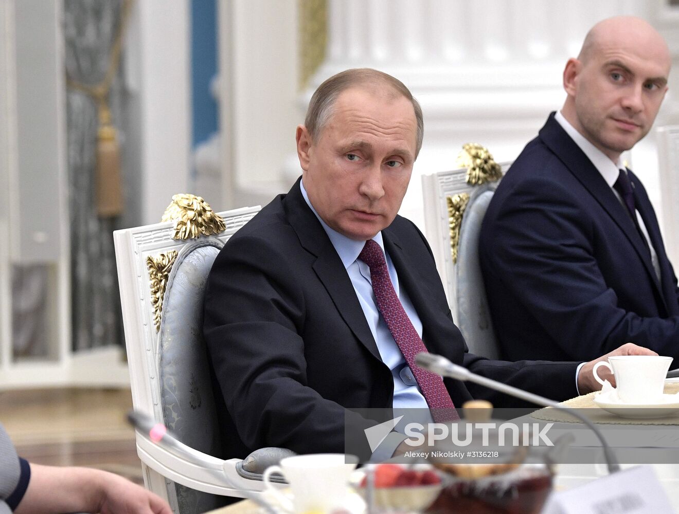 Russian President Vladimir Putin meets with graduating class teachers