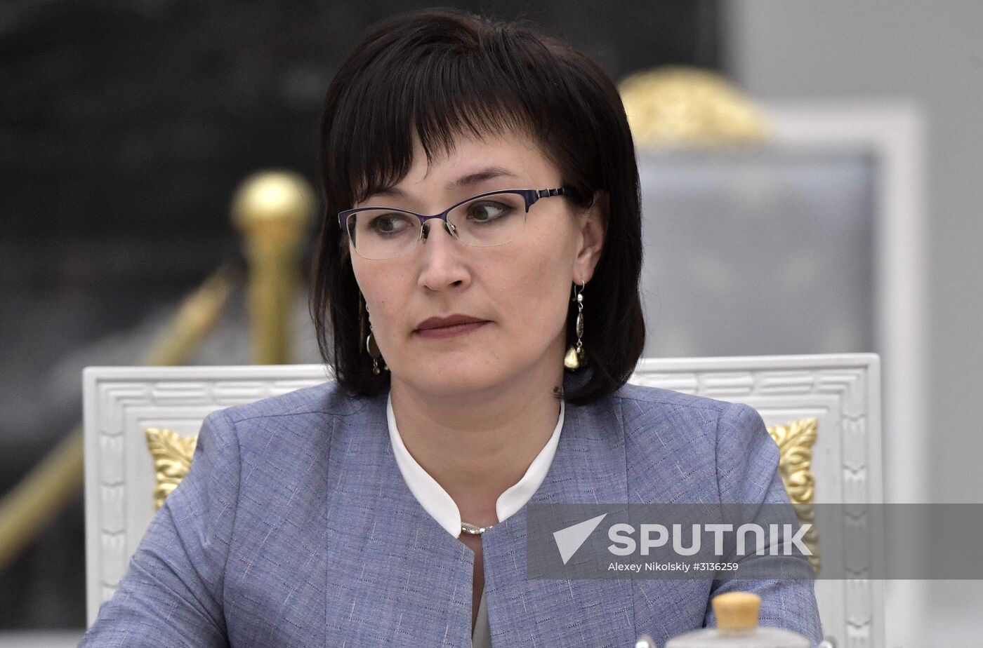 Russian President Vladimir Putin meets with graduating class teachers