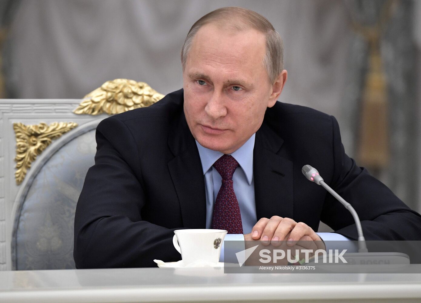 Russian President Vladimir Putin meets with graduating class teachers