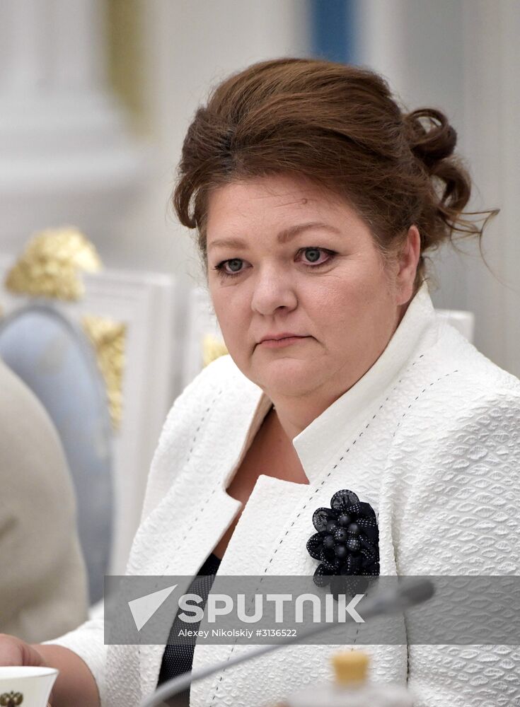 Russian President Vladimir Putin meets with graduating class teachers