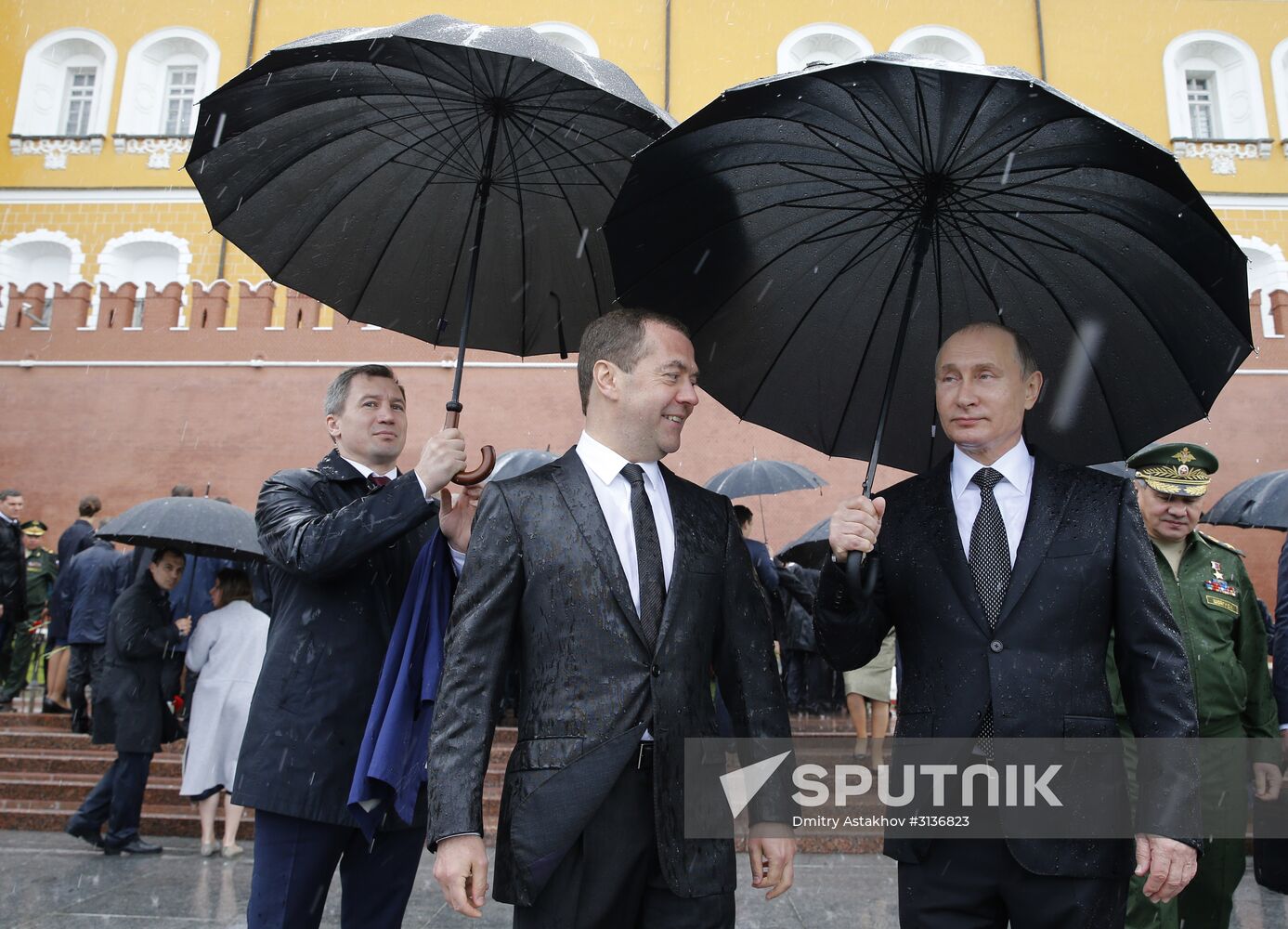 Russian President Vladimir Putin and Prime Minister Dmitry Medvedev lay flowers at Tomb of the Unknown Soldier