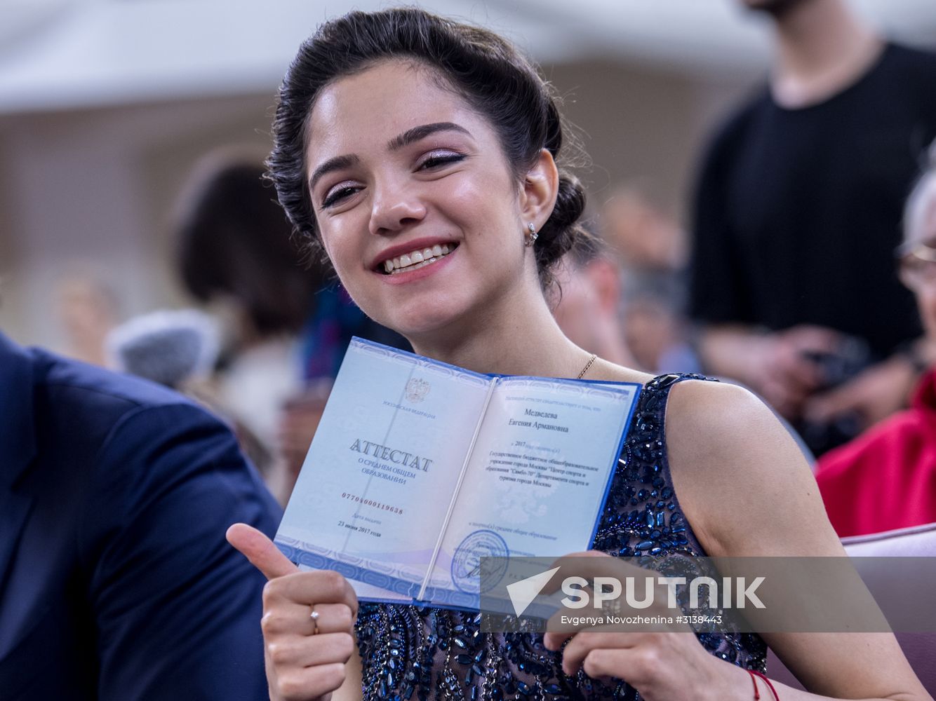 Figure skater Evgenia Medvedeva gets graduation certificate