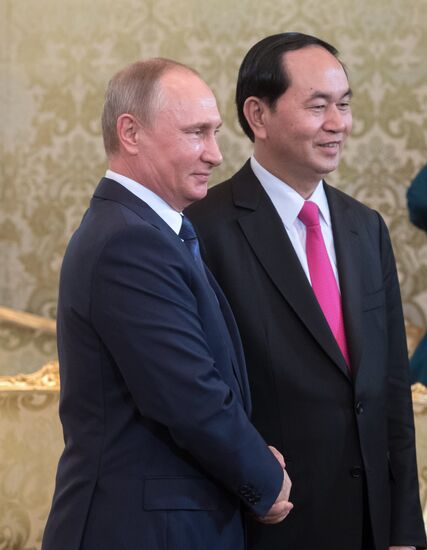 Russian President Vladimir Putin meets with President of Vietnam Tran Dai Quang