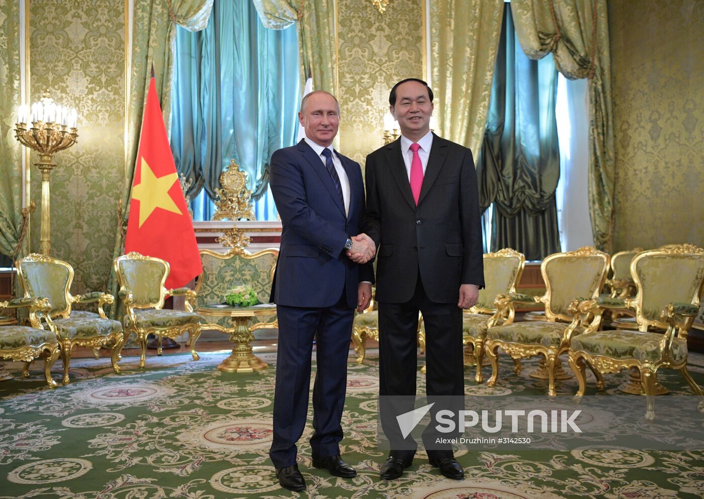 Russian President Vladimir Putin meets with President of Vietnam Tran Dai Quang