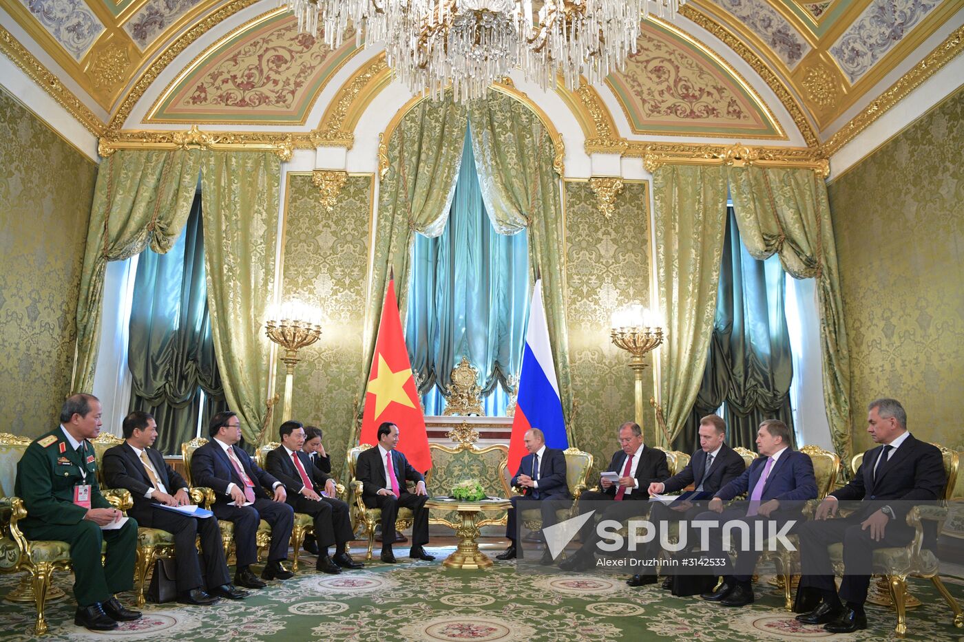 Russian President Vladimir Putin meets with President of Vietnam Tran Dai Quang