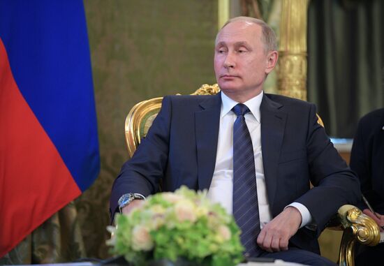 Russian President Vladimir Putin meets with President of Vietnam Tran Dai Quang