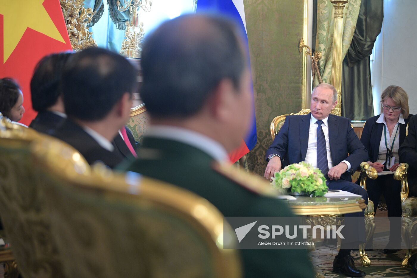 Russian President Vladimir Putin meets with President of Vietnam Tran Dai Quang
