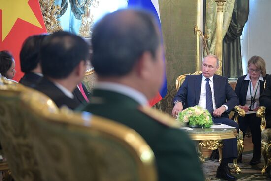 Russian President Vladimir Putin meets with President of Vietnam Tran Dai Quang