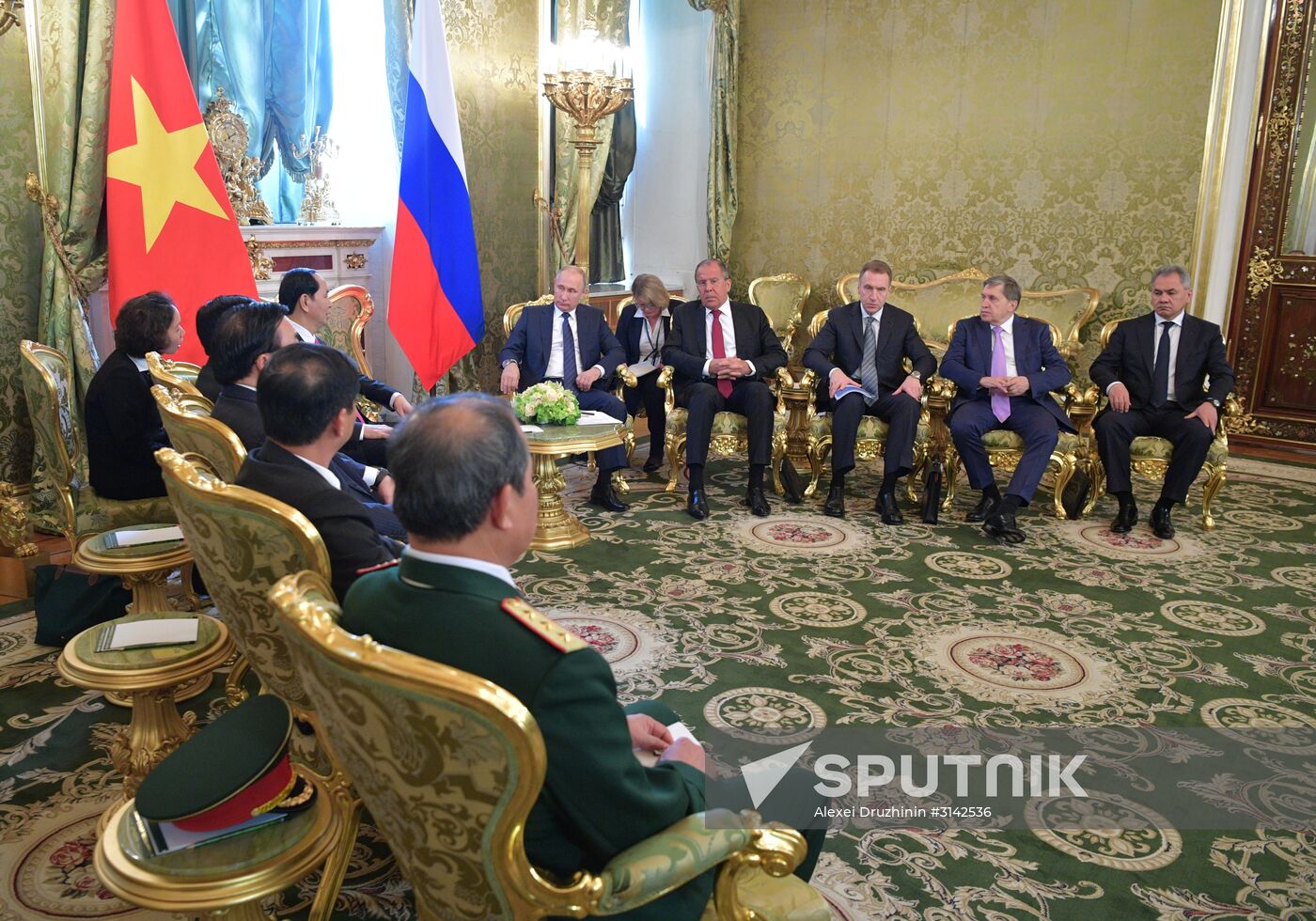 Russian President Vladimir Putin meets with President of Vietnam Tran Dai Quang