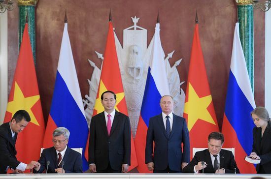 Russian President Vladimir Putin meets with Vietnamese President Tran Dai Quang