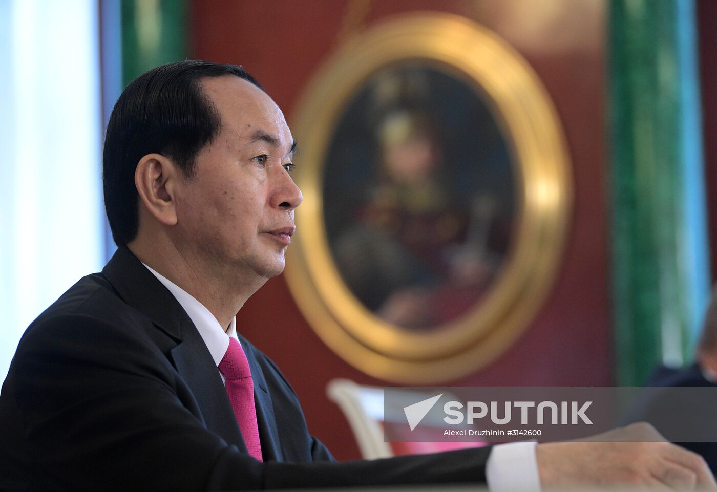 Russian President Vladimir Putin meets with Vietnamese President Tran Dai Quang