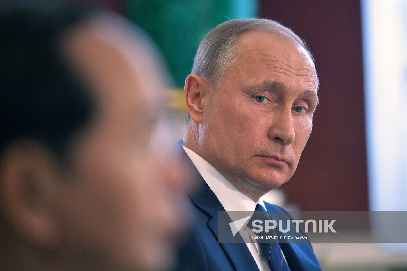Russian President Vladimir Putin meets with Vietnamese President Tran Dai Quang