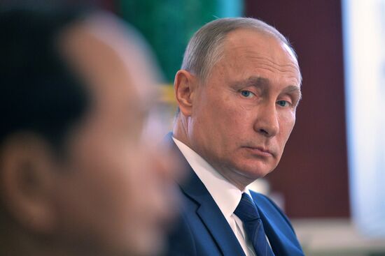 Russian President Vladimir Putin meets with Vietnamese President Tran Dai Quang