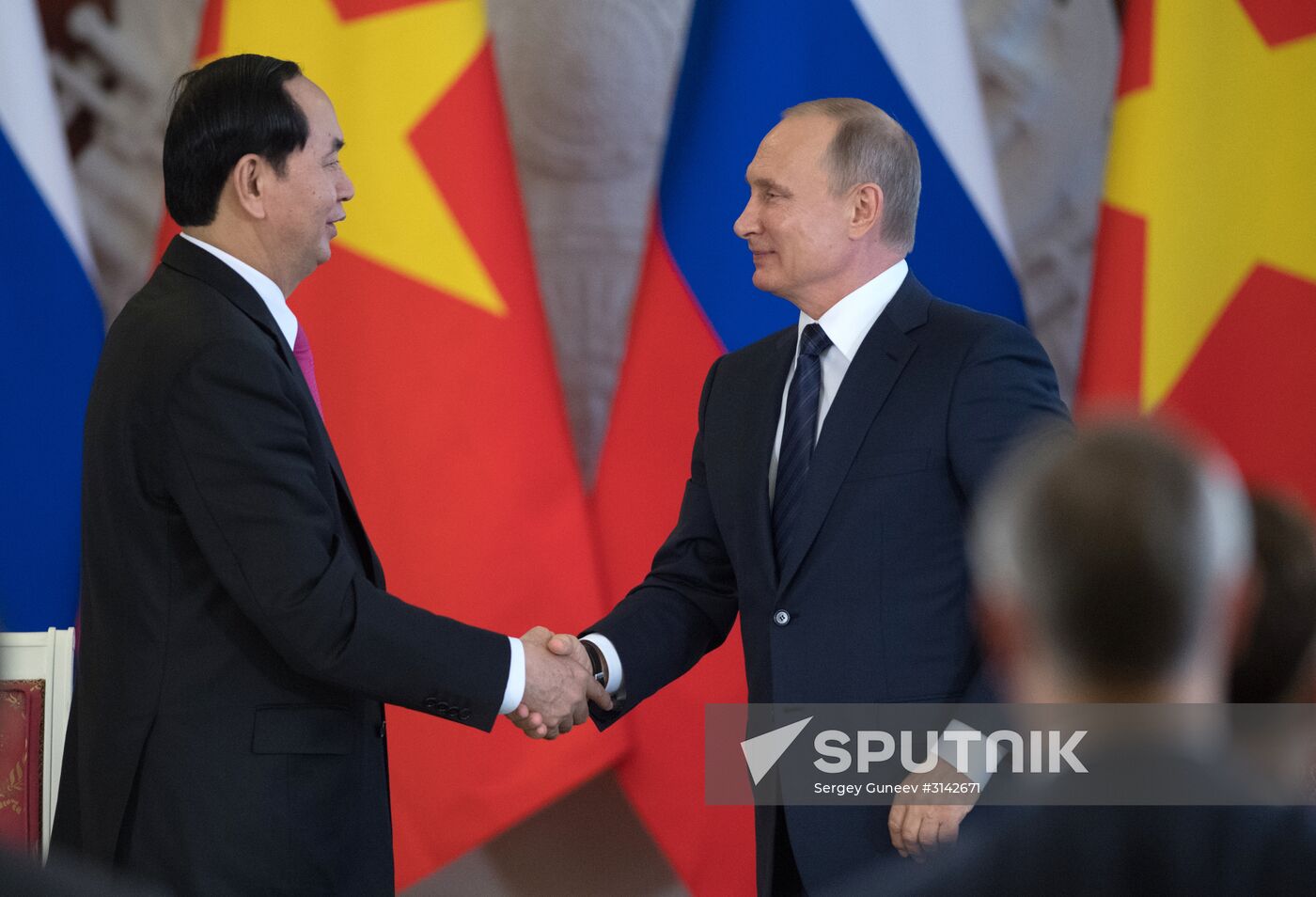 Russian President Vladimir Putin meets with Vietnamese President Tran Dai Quang