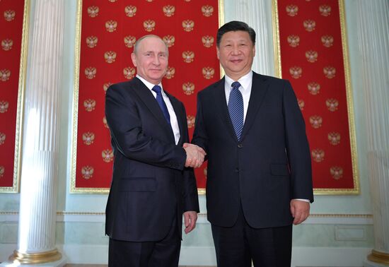 President Vladimir Putin meets with President of China Xi Jinping