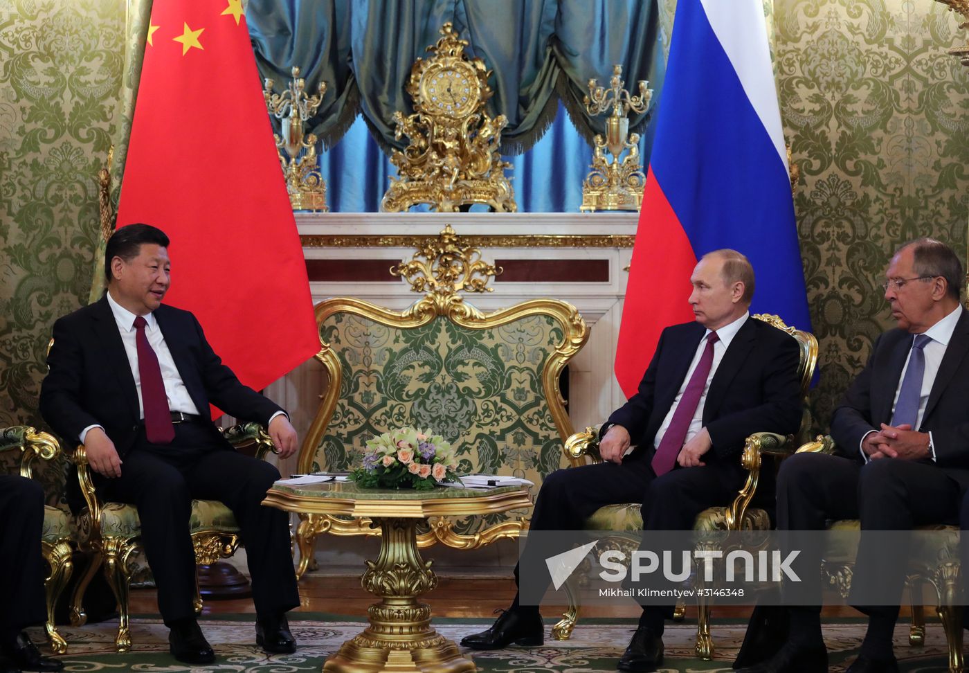 Vladimir Putin meets with Xi Jinping in Moscow