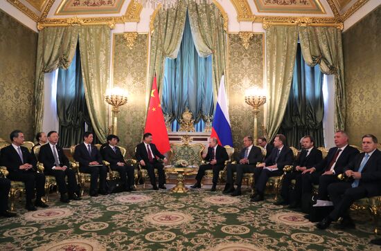 Vladimir Putin meets with Xi Jinping in Moscow