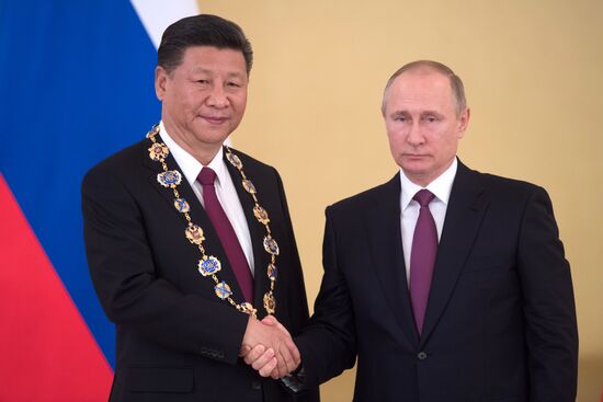 Vladimir Putin meets with Xi Jinping in Moscow