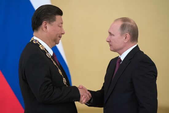 Vladimir Putin meets with Xi Jinping in Moscow