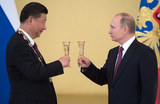 Vladimir Putin meets with Xi Jinping in Moscow