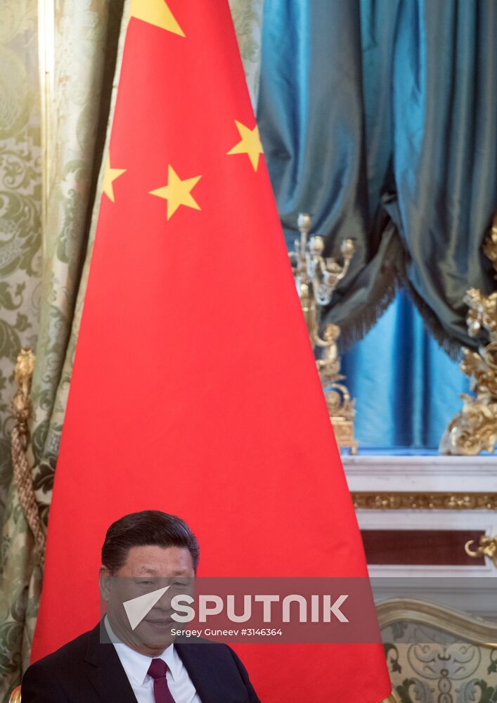 Vladimir Putin meets with Xi Jinping in Moscow