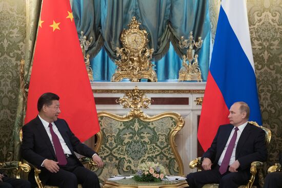 Vladimir Putin meets with Xi Jinping in Moscow