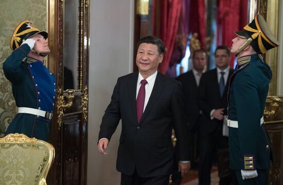 Vladimir Putin meets with Xi Jinping in Moscow