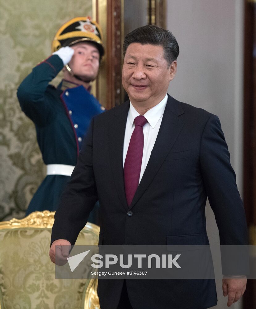 Vladimir Putin meets with Xi Jinping in Moscow