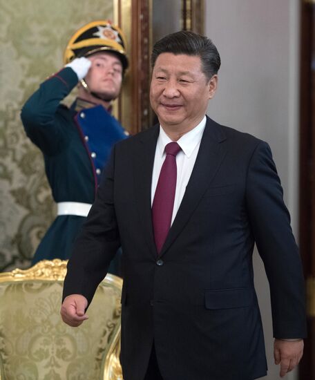 Vladimir Putin meets with Xi Jinping in Moscow