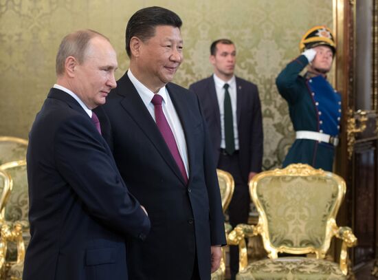 Vladimir Putin meets with Xi Jinping in Moscow