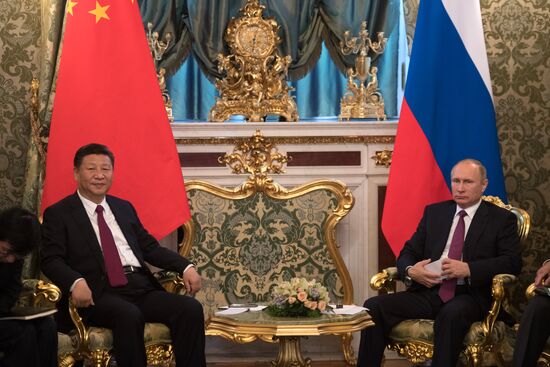 Vladimir Putin meets with Xi Jinping in Moscow