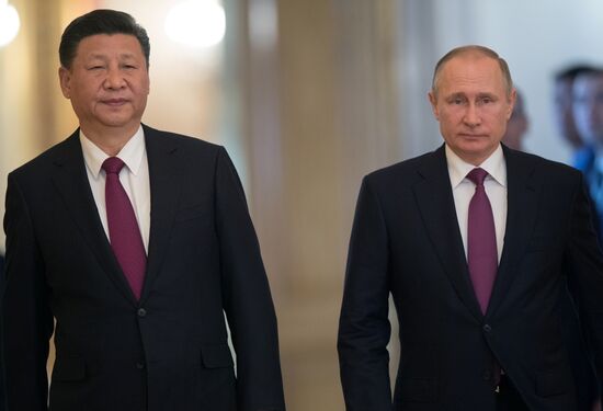 Vladimir Putin meets with Xi Jinping in Moscow